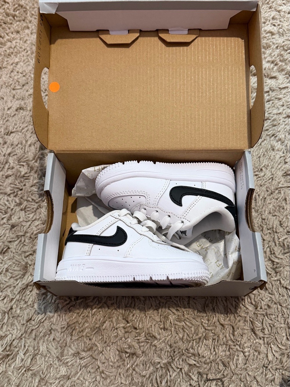 Nike Kids White Sneakers with Black Swoosh